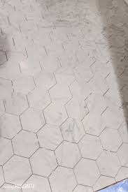 9 Modern Farmhouse Tile Ideas How To Tile A Floor Making Manzanita Marble Tile Bathroom Modern Farmhouse Bathroom Hexagon Marble Tile