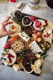 The Most Decadent Comforting Cheese Boards Happen In Winter And Are Made Even Better If They Includ Winter Cheese Boards Cheese Plates Appetizer Food Platters