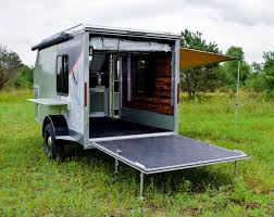 Composite Camping Trailers Blur The Line Between Backcountry Lodge And Toy Hauling Garage Camping Trailer Cargo Trailer Camper Trailer