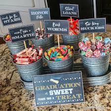 The candies can also serve as the favors for the guests. Shower Of Roses Graduation Party Candy Buffet Free Printables