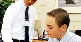 Pope John Paul II students exchange roles with school staff for the day