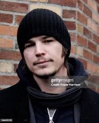 Actor Guy Pearce and Georgia Archer walk