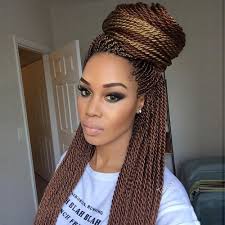 The twists are medium sized, long and accessorized, they also have a stylish blue black color to them also. 50 Catchy And Practical Flat Twist Hairstyles Hair Motive Hair Motive