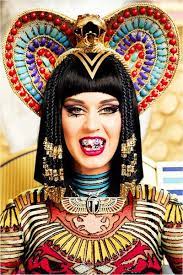 Makeup Hairstyle Trend Review Get The Look Katy Perry Debuts Dark Horse Music Video Covergirl Gold And Purple Glitter Egyptian Eye Beautystat Com Katy Perry Makeup Katy Perry Costume Katy