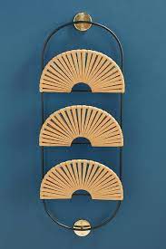 Make a statement with measuring 20'' h x 6'' w x 3'' d, this bamboo design features three tiers for collecting mail and a trio. Megan Leather Fan 3 Tier Magazine Rack