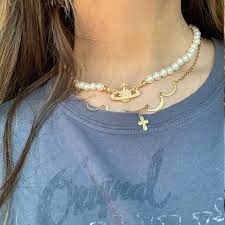 5 out of 5 stars. Vivienne Westwood Jewelry Vivienne Westwood Saturn Orb Pearl Gold Necklace Poshmark