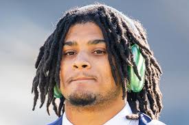 Notre Dame's Howard Cross, Riley Leonard, and Xavier Watts