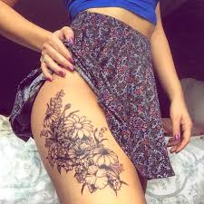 Heyheyjules Like A Wildflower She Grew In All The Places People Never Thought With Images Floral Thigh Tattoos Flower Thigh Tattoos Thigh Tattoo Designs