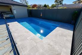 The Combination Of Ezarri Glass Mosaic Tile Iris Azur And Pds 2cm Paver Shale Grey Surrounds In This Pool Project Is Truly Glass Mosaic Tiles Mosaic Glass Pool