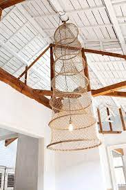 Diy Instant Light Made From A Fishing Basket Remodelista Fishing Basket Lights Light