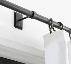 Add to favorites curtain brackets iron curtian rod brackets , dowel 1 1/2 to 2 inches heavy duty sold in pairs blacksmith black or bronze paint. Cast Iron Black Room Darkening Curtain Rod Wall Bracket Pottery Barn