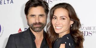 John Stamos' fiancee Caitlin McHugh debuts baby bump