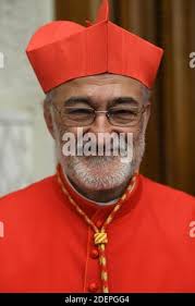 New cardinal Cristobal Lopez Romero (Spanish-born prelate and Archbishop of  Rabat, Morocco) poses as he meets with relatives and friends during a  courtesy visit following his appointment by the Pope Francis, during