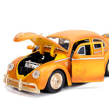 Transformers ls07 beetle car model mpm bumblebee robot toy. Amazon Com Jada Toys Transformers Bumblebee Volkswagen Beetle Die Cast Car 1 24 Scale Vehicle 2 75 Charlie Collectible Metal Figurine Toys Games