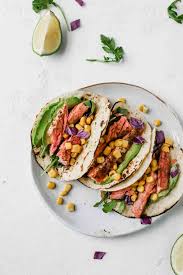 Heat tortillas in a skillet over the stovetop or panini maker until hot on both sides. Spicy Salmon Tacos W Avocado Lime Dressing Jar Of Lemons
