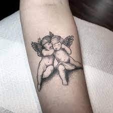 Twin angels tattoo