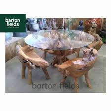 Check out our teak dining chairs selection for the very best in unique or custom, handmade pieces from our dining chairs shops. Glass Topped Root Table And Four Chair Dining Garden Table Set Made From Reclaimed Teak