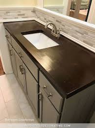 For example, you can fashion a laundry room countertop from an inexpensive wood door along with three yards of fabric and a couple of quarts of modge podge. Bathroom Countertop Ideas Bathroomdiy Kitchen Remodel Countertops Kitchen Design Diy Concrete Kitchen