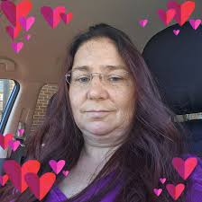 What are some recommendations for a great black and white tattoo artist in  the C-ville area, specializing in military style and new school tattoos?