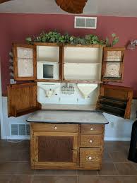 Beautiful old oak hoosier cabinet complete with flour sifter/bin on right side. Antique Hoosier Oak Kitchen Cabinet