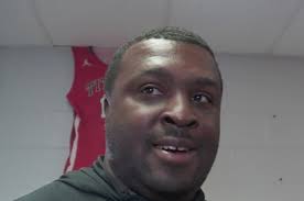 Carl Albert coach shaping lives in the barber chair