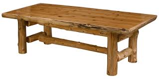 Kitchen and log dining room table, from northern white cedar logs, finished with several coats of high quality uv protection clear furniture finish. Deluxe Cedar Log Dining Table Minnesota Log Furniture Custom Cabin Furniture