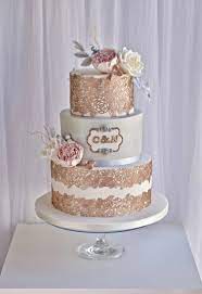 Elegant 3 Tier Rose Gold Wedding Cake With Sugar Peonies And Roses Weddingcakeinspiration Rose Gold Wedding Cakes Wedding Cake Roses Gold Cake Topper Wedding