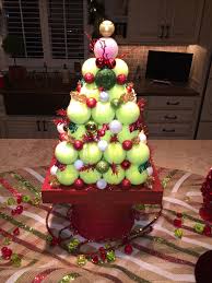 Awesome Christmas Tree Centerpiece Made With Tennis Balls My Friend Made For Our Tennis Party Tennis Crafts Tennis Christmas Tennis Christmas Tree