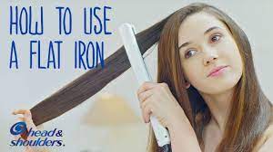 Feed a section of hair through your open flat iron, clamp the plates down about an inch or two from your roots, and then wrap the section around the iron once, sliding it down the length of the section. 6 Steps To Straighten Your Hair Using A Flat Iron Without Damage Healthy Hair Tips Youtube