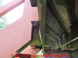 The inspector mentioned possibly just nailing in additional 2x boards to the beam until it's built out enough to put decking on without a big gap to the house. Attach The Stair Stringers To The Deck Landing Or Porch