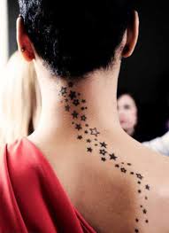 One of them is very much visible, as the stars run down from her neck to her back. 45 Amazing Rihanna Tattoos Designs Amazing Tattoo Ideas Rihanna Tattoo Star Tattoos Rihanna Star Tattoo