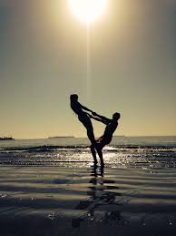 Couples Yoga On Long Beach Ca Beautiful Day In Cali Couples Yoga Couples Yoga Poses Partner Yoga Poses