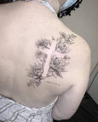 The feminine cross tattoo is generally drawn using hearts, stars or any other small figures around the picture design which contains the feminine cross can also be inked on her arms, the back of the design can also be a celtic or tribal cross combined with flowers. Top 63 Best Cross Tattoo Ideas For Women 2021 Inspiration Guide