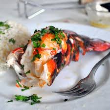 To grill your lobster tails once your grill is ready, set your sauce pot off to the side and place your lobster tails meat side down over direct high heat. Cooking With Manuela Grilled Lobster Tail With White Wine Risotto