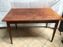 Now it's a low coffee table during the day, but can be folded up into a high dining table when needed: Fold Out Dining Table 1950s For Sale At Pamono