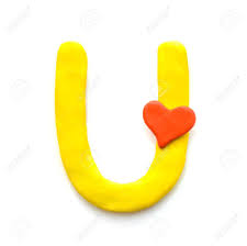 Maybe you would like to learn more about one of these? Yellow Plasticine Letter U English Alphabet With Red Heart Meaning Love On Valentine S Day Isolate On White Background Stock Photo Picture And Royalty Free Image Image 115449357