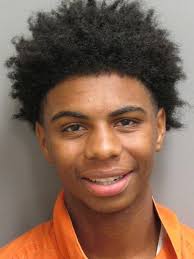 Four arrested in person robbery