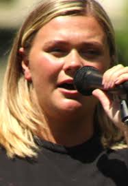 At Rally, 125 Take Knee In George Floyd's Memory