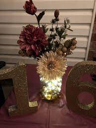 Sweet 16 marsala/burgundy and champagne table decor with. Flower Arrangement With Fairy Lights For Sweet 16 Birthday Party Flowerarrangements Diy C Sweet 16 Birthday Party Sweet 16 Decorations Sweet 16 Centerpieces