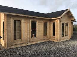Holzhaus Mit 70 Mm Wandstarke Als Burogebaude Hansagarten24 Garden Log Cabins Large Summer House Summer House