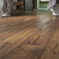 Shop Pergo Max Premier 7 48 In W X 4 52 Ft L Amber Chestnut Embossed Laminate Wood Planks At Lowes C Wood Laminate Flooring Pet Friendly Flooring Wood Laminate