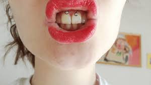 Industrial piercing is quite unusual, as a double puncture is connected by a single barbell. Smiley Frenulum Piercing Info Guide