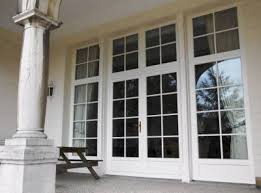 Baie Vitree Avec Porte Fenetre Centrale Ensemble En Pvc A Croisillons Style Et Authenticite