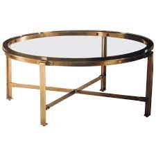 Brass is a nice way to accent the home, especially if you encorporate a long of wood into your decor. French Mid Century Modern Style Round Antique Brass Coffee Table Jacques Quinet Brass Coffee Table Coffee Table French Mid Century Modern