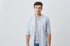 Watch short videos about #brownhairblueeyes on tiktok. Free Photo Cheerful Pleased Caucasian Guy With Blue Eyes And Dark Hair Dressed In Elegant Blue Shirt Smiling In Good Mood While Posing In Studio Facial Expressions Concept
