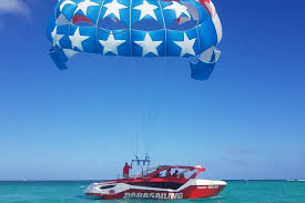Parasailing, snorkel cruise, sharks & stingrays encounter. Spacetraveller Activity Punta Cana Parasailing
