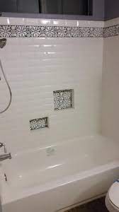 Porcelain floor and wall tile (16.146 sq. Merola Tile Galaxy Flower White 4 1 4 In X 12 3 4 In X 9 Mm Porcelain Border Mosaic Tile Fshgfbwh The Home Depot Bathrooms Remodel Bathtub Tile Surround Bathroom Remodel Master