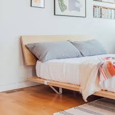 As you can see the steel brackets slide onto the wooden planks. The Floyd Platform Bed Floyd Floyd Bed Bed Frame And Headboard Bed
