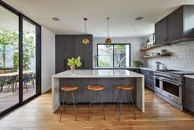 Very popular, clean and contemporary shaker door cabinets in a rich stained gray finish!1/2 plywood. Photo 9 Of 17 In A Modern L A Home Mixes California Mediterranean With Art Deco Vibes Dwell