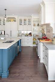 It's time to consider cream kitchen cabinets. Farmhouse Kitchen With Blue Island Home Bunch Interior Design Ideas